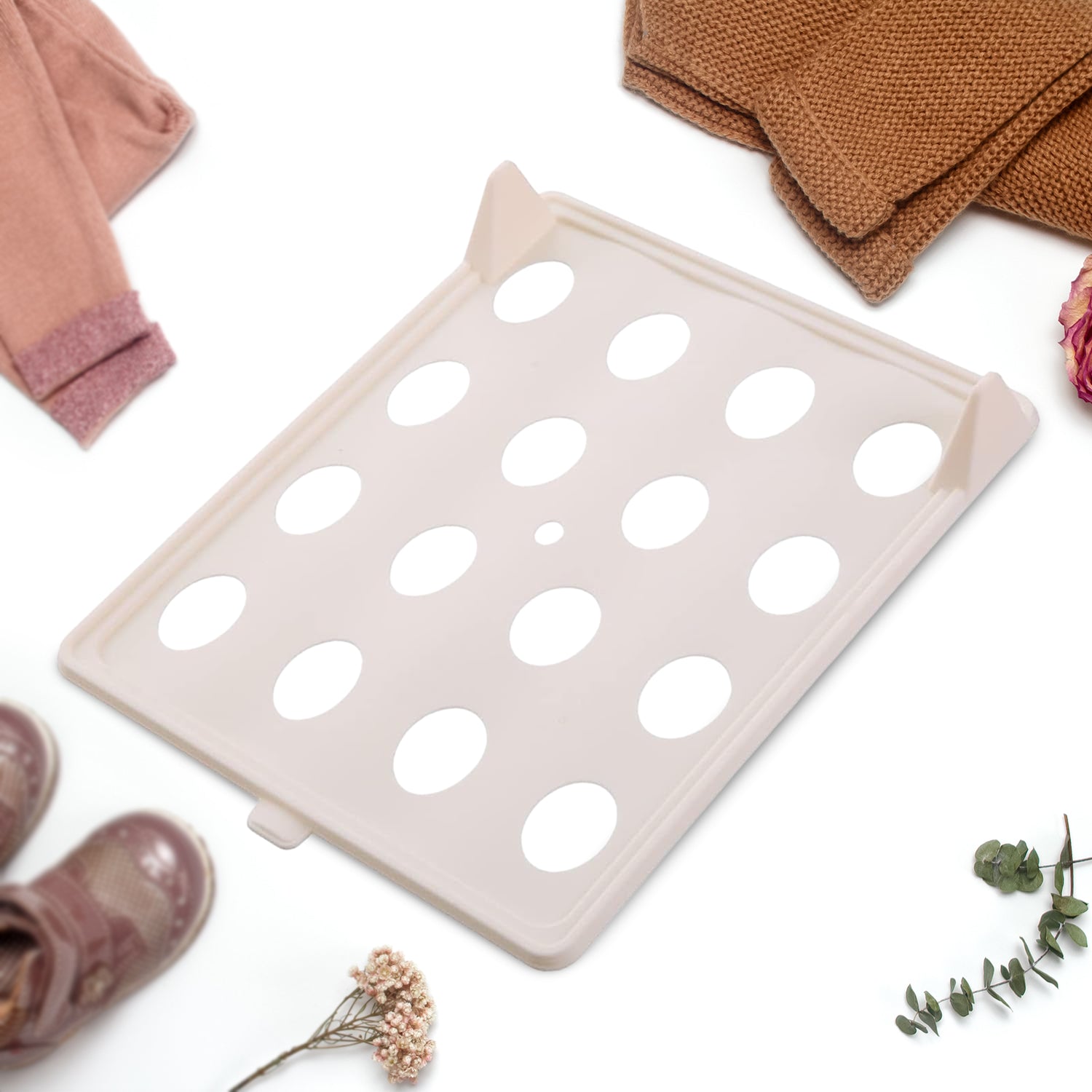 Wukusy stackable shirt folding board for clothes, compact home improvement tool, neatly folded shirts in the image.