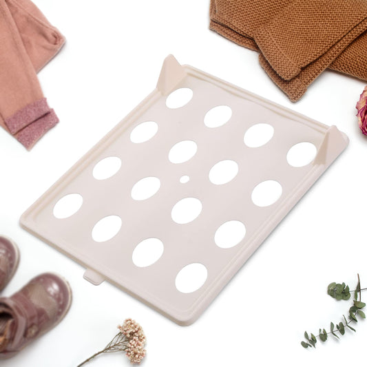 Wukusy stackable shirt folding board for clothes, compact home improvement tool, neatly folded shirts in the image.