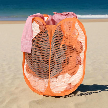 Wukusy foldable pop-up mesh laundry basket hamper with breathable mesh sides and sturdy frame for easy laundry storage and transport.
