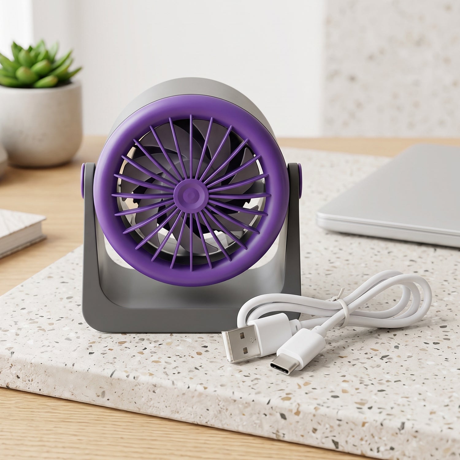 Wukusy personal desktop air circulation fan USB portable desk fan on a table, compact and lightweight for personal cooling.