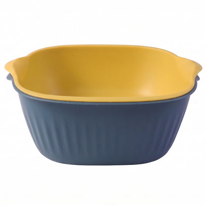 Wukusy 2-in-1 plastic washing bowl with integrated drain basket, ideal for laundry and kitchen tasks, shown with water and utensils.