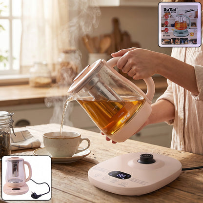 Wukusy Suta electric glass kettle with 2.3L capacity, infuser, and temperature control, shown filled with boiling water.