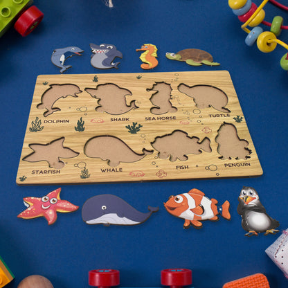 Wooden seawater animal puzzle toy by Wukusy featuring colorful animal pieces for educational learning and fine motor skills.