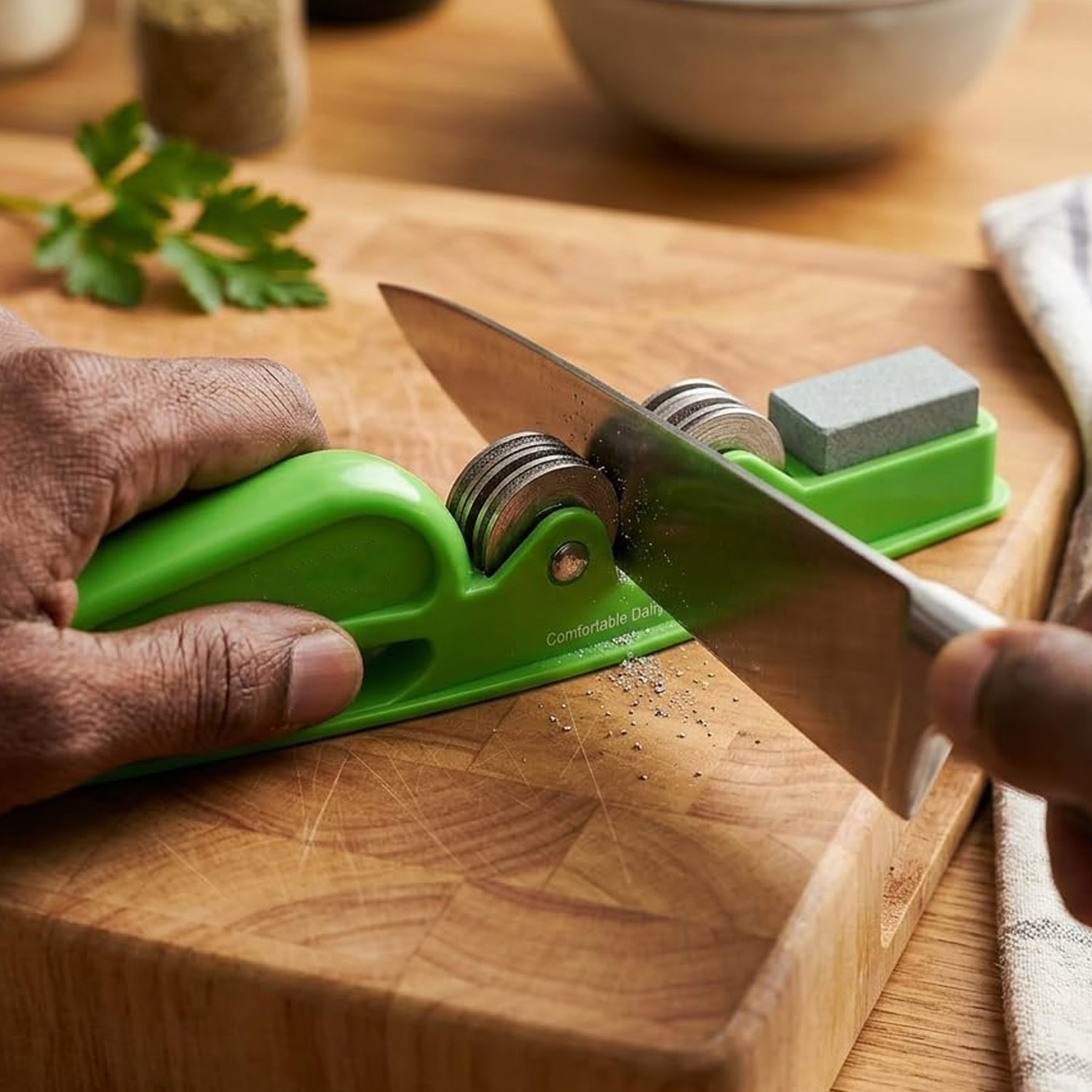 Wukusy handheld knife sharpener with grip handle, manual blade sharpening tool, compact and easy to use for kitchen knives.