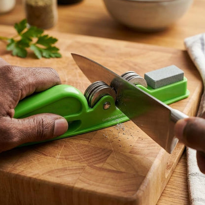 Wukusy handheld knife sharpener with grip handle, manual blade sharpening tool, compact and easy to use for kitchen knives.