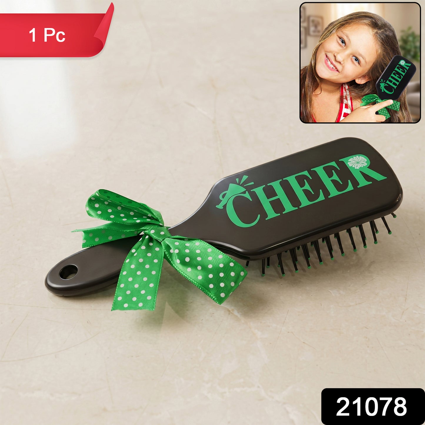 Kids printed hair brush with a cute ribbon bow handle by Wukusy, designed for gentle detangling and easy styling.