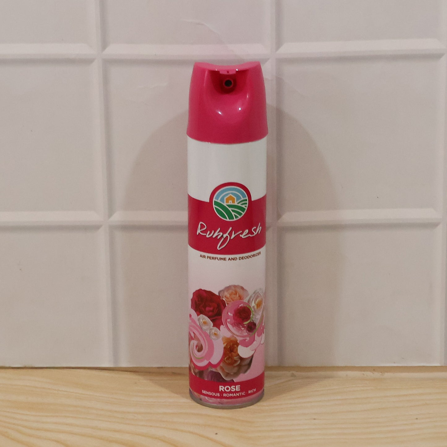 Wukusy Rose air freshener spray bottle, 220 ml, with a floral design, ready to freshen indoor spaces with a rose scent.