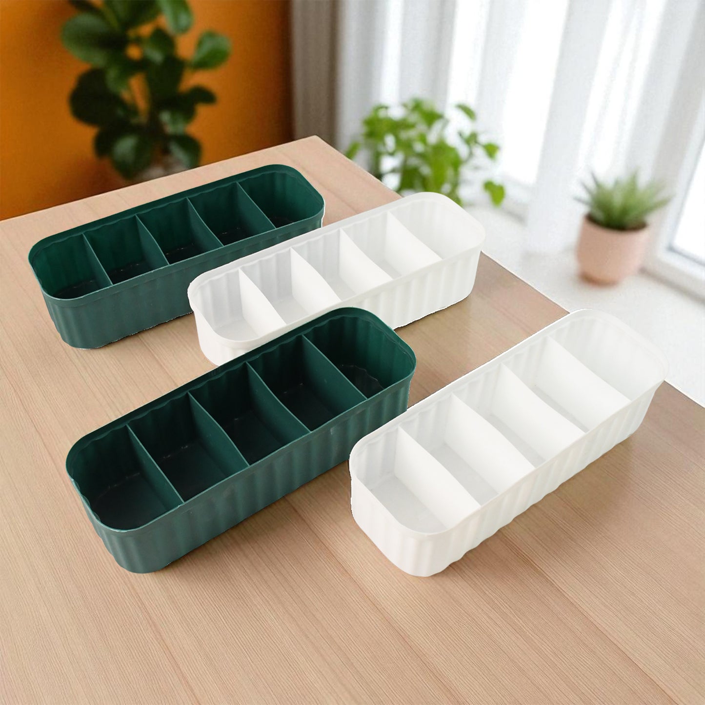 Wukusy 4-pack sock, underwear, and accessory storage boxes with 5 compartments for closet organization, shown stacked in a drawer.