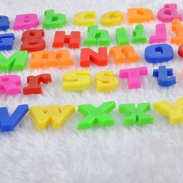 Wukusy 1924 Magnetic Letters toy set with colorful plastic letters for learning spelling and alphabet skills.