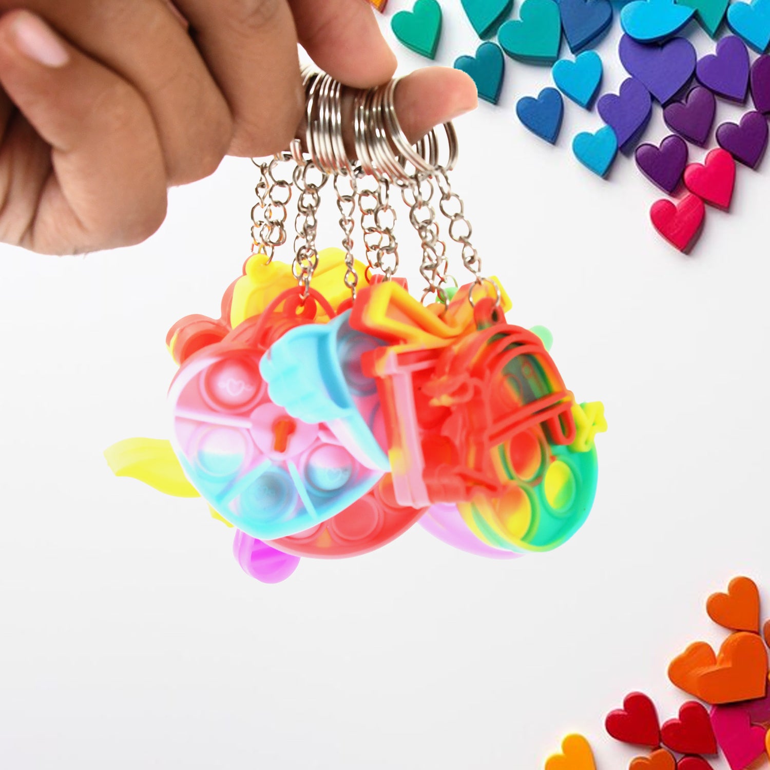 Wukusy Compact Silicone Pop It keychain toy with colorful bubble designs, portable fidget toy for stress relief and kids' birthday gifts