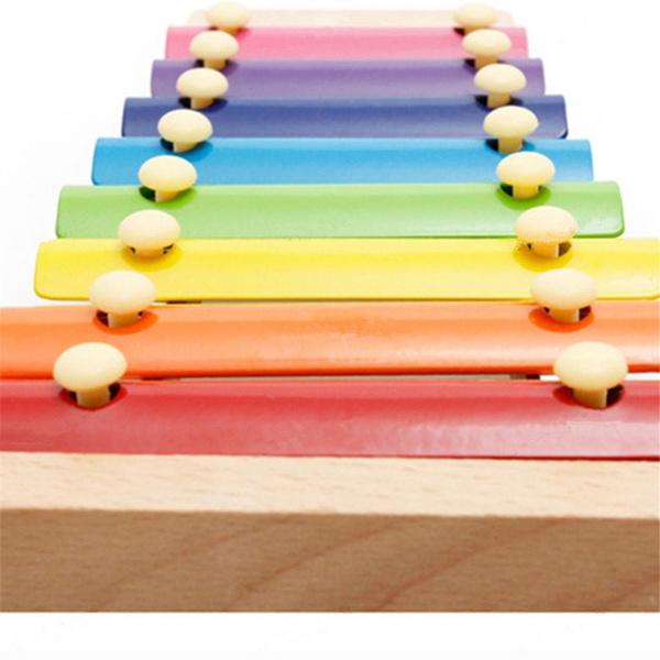 Colorful Wukusy 1912 wooden xylophone toy for children with multicolored bars and musical keys, perfect for early childhood music play.