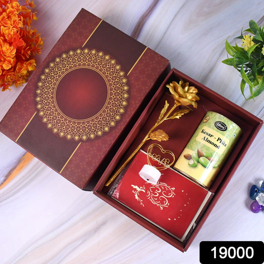 Valentines Day gift box by Wukusy with heart-shaped light chocolates and a golden flower decoration, perfect for romantic occasions.