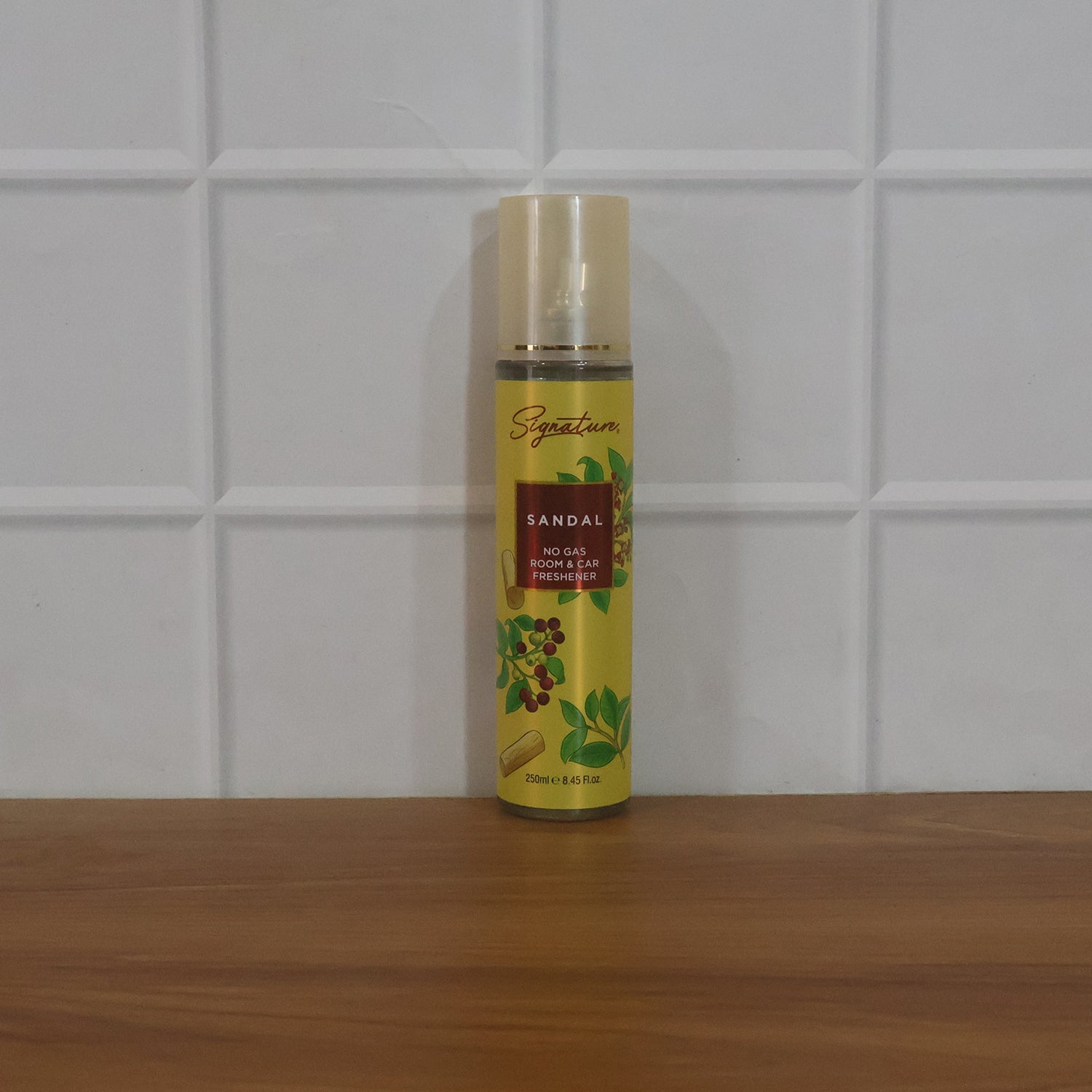 Wukusy Signature Sandal Room Car Freshener Spray 250ml with a sleek spray bottle and sandalwood scent label.