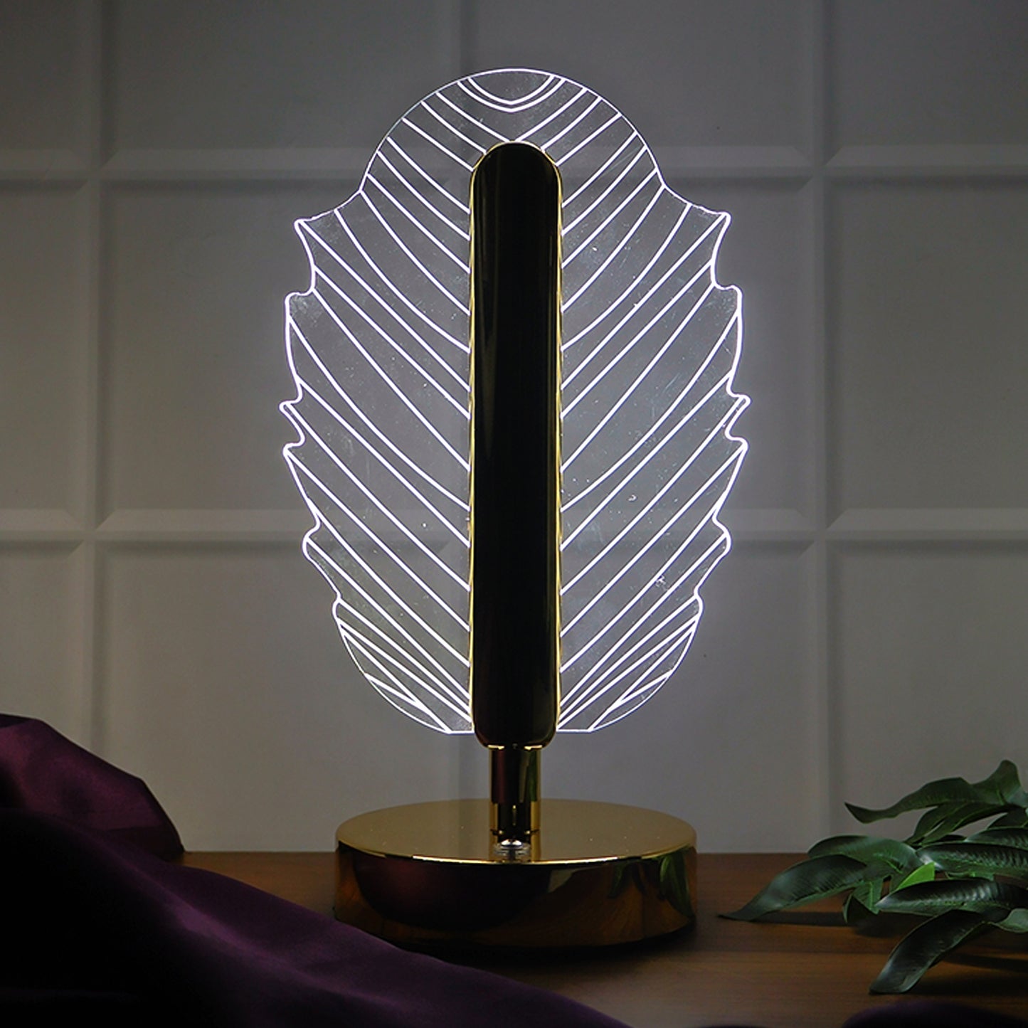 Wukusy premium leaf-shaped crystal table lamp for home decor, featuring a detailed crystal leaf design on a sleek base.