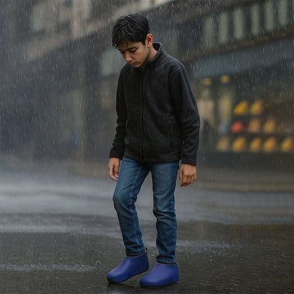 Pair of Wukusy blue non-slip silicone rain boot covers, waterproof, foldable, anti-skid travel shoe protectors in the image.