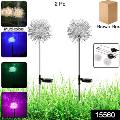Two solar-powered dandelion garden lights by Wukusy illuminating a garden at dusk with delicate flower designs.