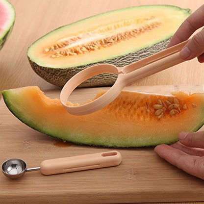 Wukusy 2-in-1 fruit scooper and cutter tool showing a stainless steel scoop and cutter blade in a hand.