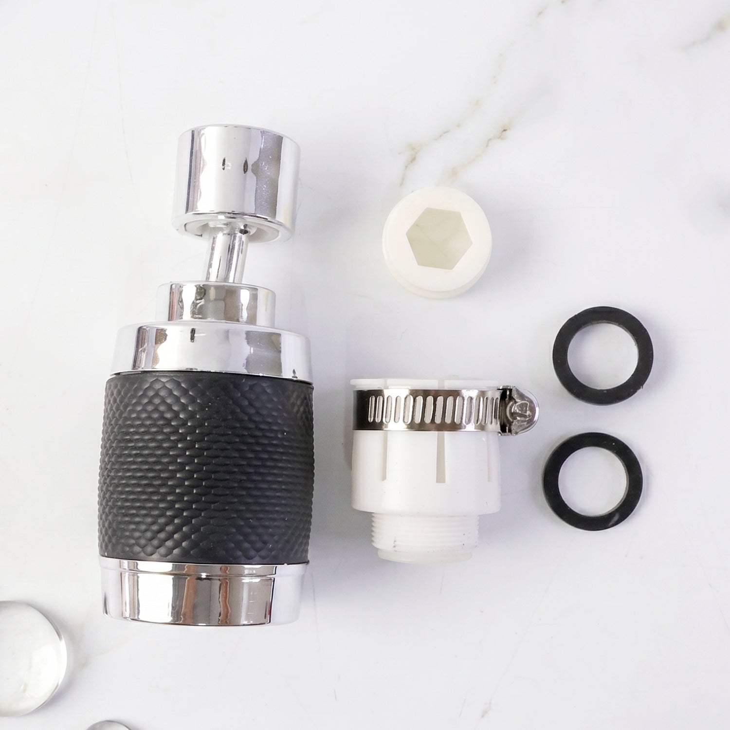 Wukusy kitchen water faucet sprayer with 360° rotatable tap extender nozzle attached to a sink for versatile water flow.