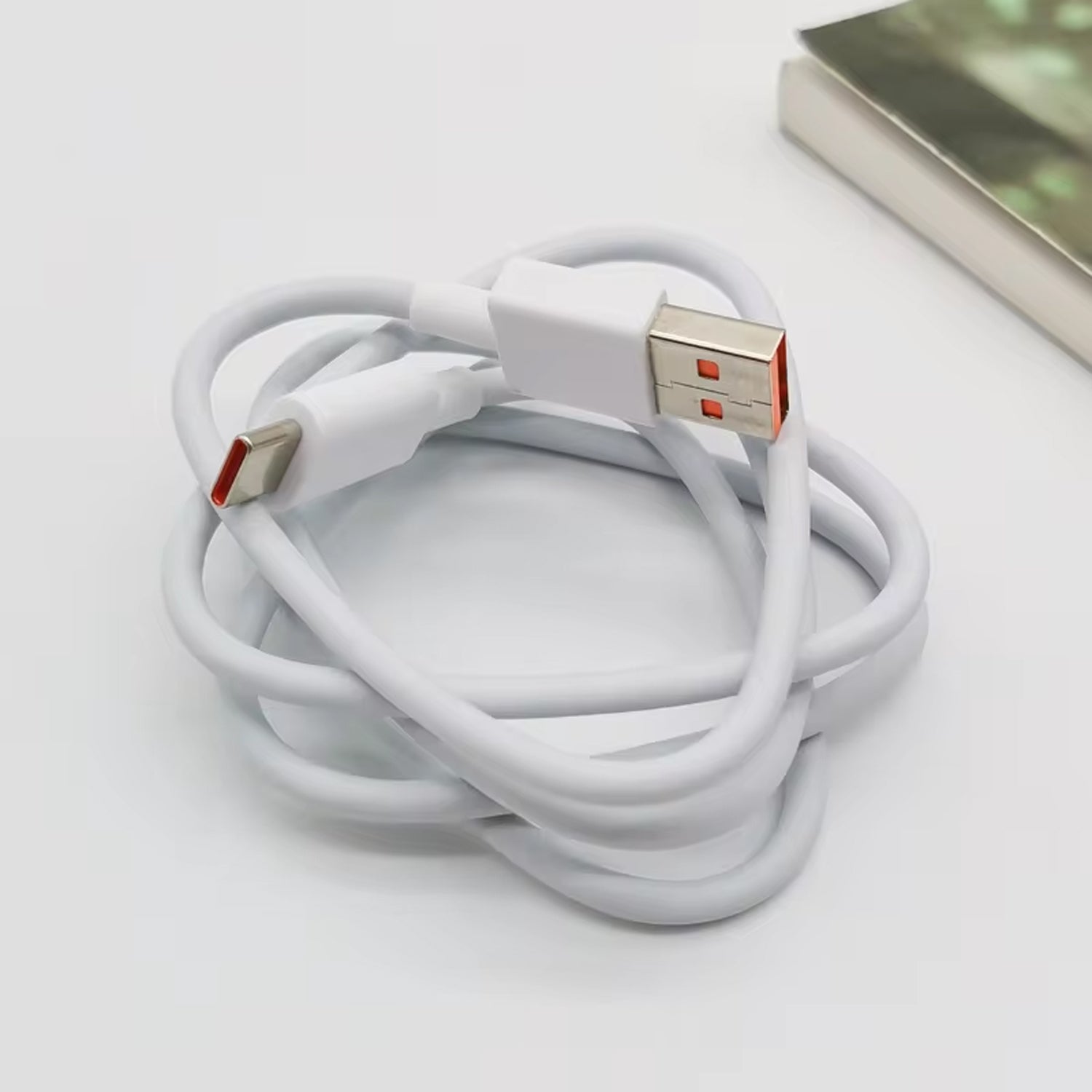 Wukusy Type C data and fast charging cable, 1 meter length, shown coiled with USB-C connector and cable in view.
