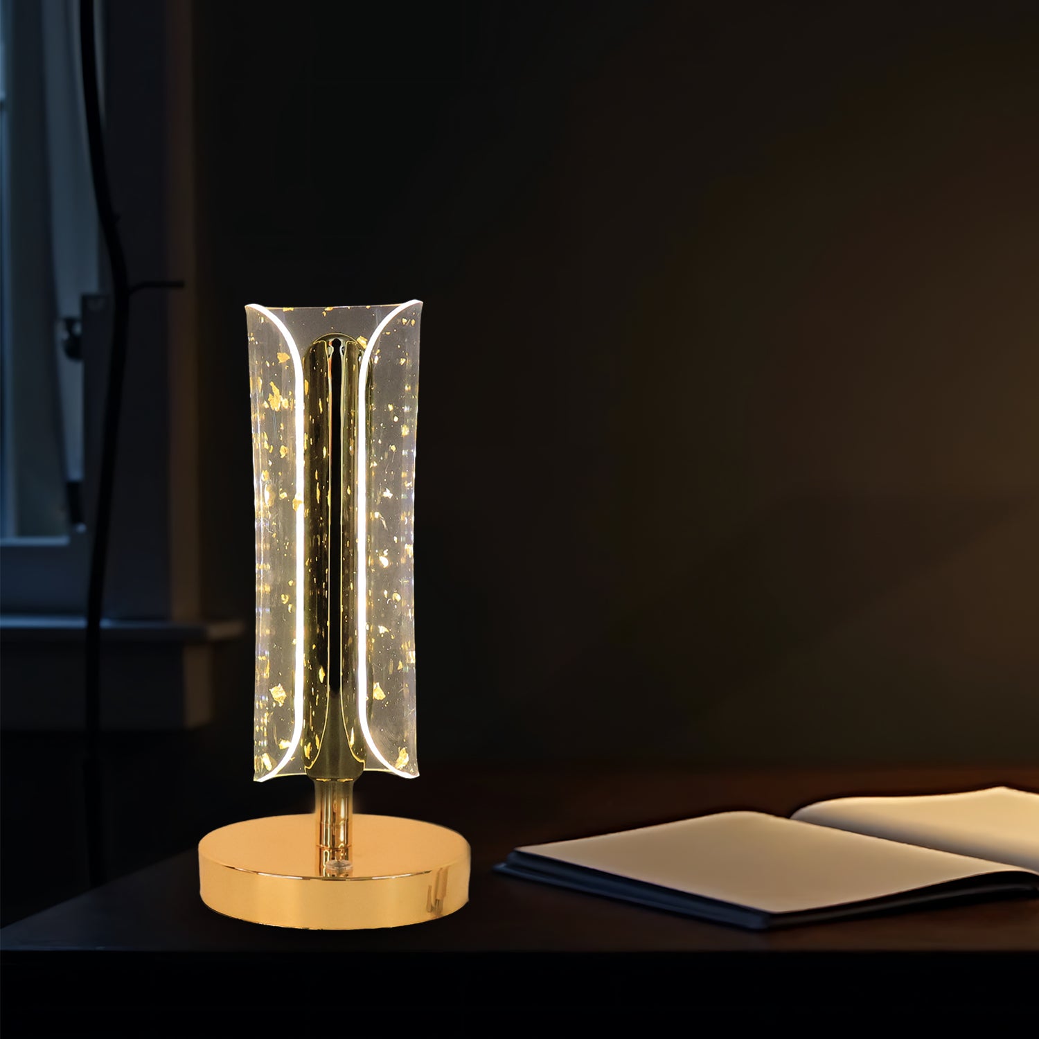 Wukusy crystal table lamp with a clear glass base and a fabric shade, illuminated to showcase its elegant design.