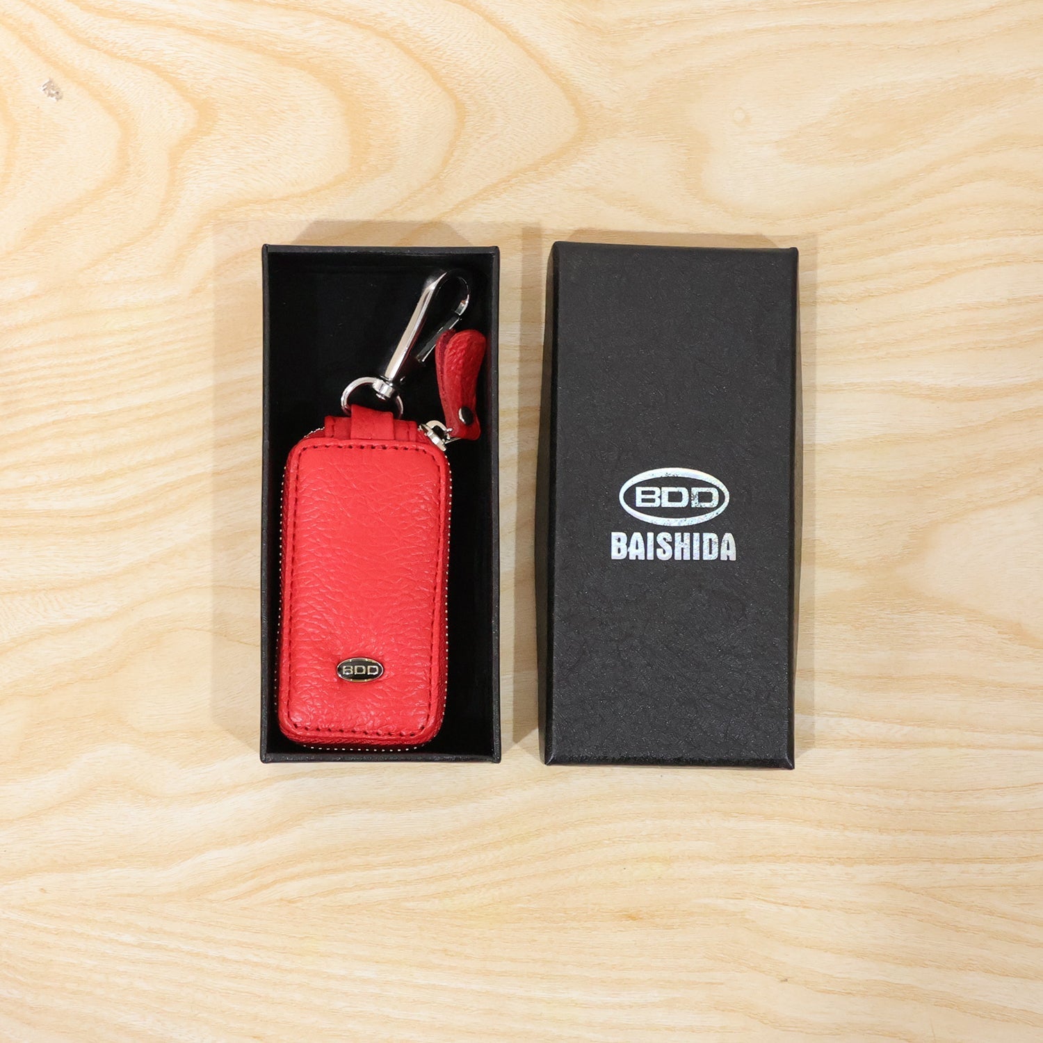 Wukusy leather car key case with zipper and snap hook, compact smart key holder pouch for secure key storage.