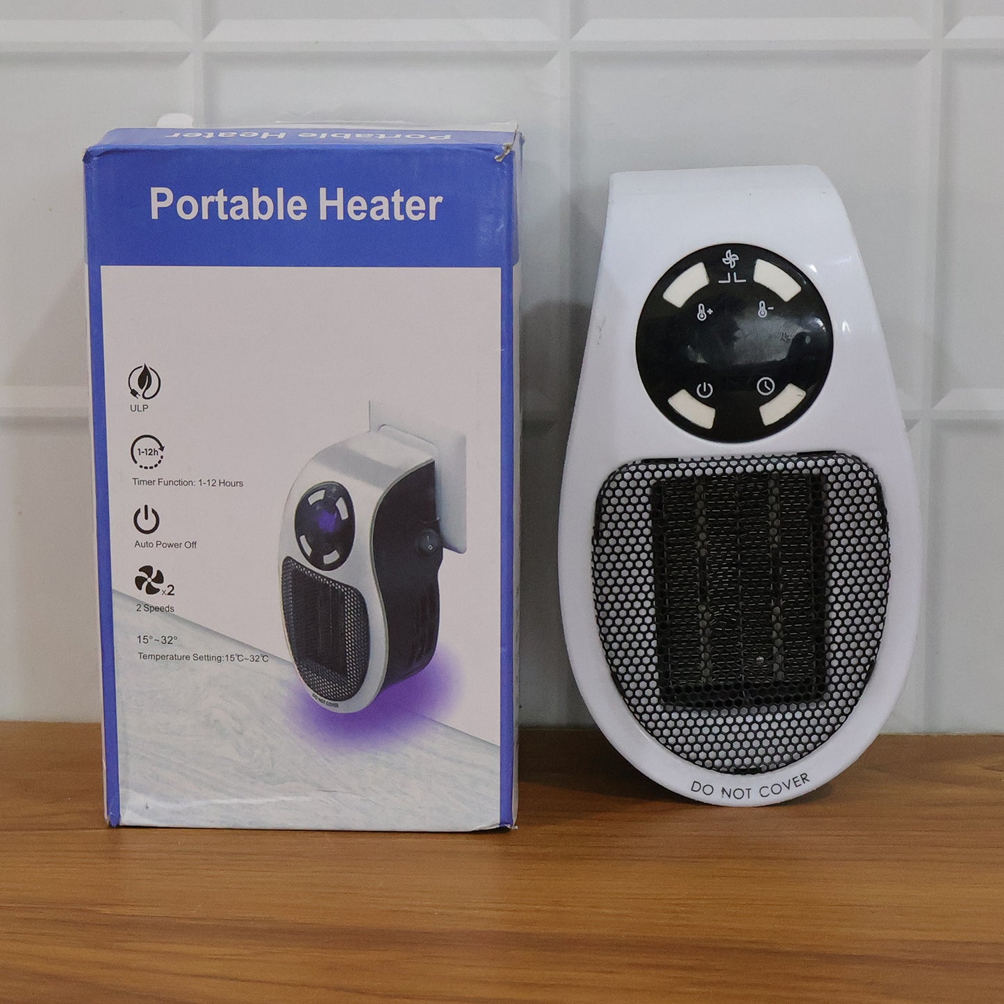 Wukusy portable electric plug-in room heater with compact design and adjustable temperature control, perfect for small spaces.