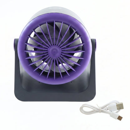 Wukusy personal desktop air circulation fan, portable USB desk fan on a workspace, compact and lightweight for personal cooling.