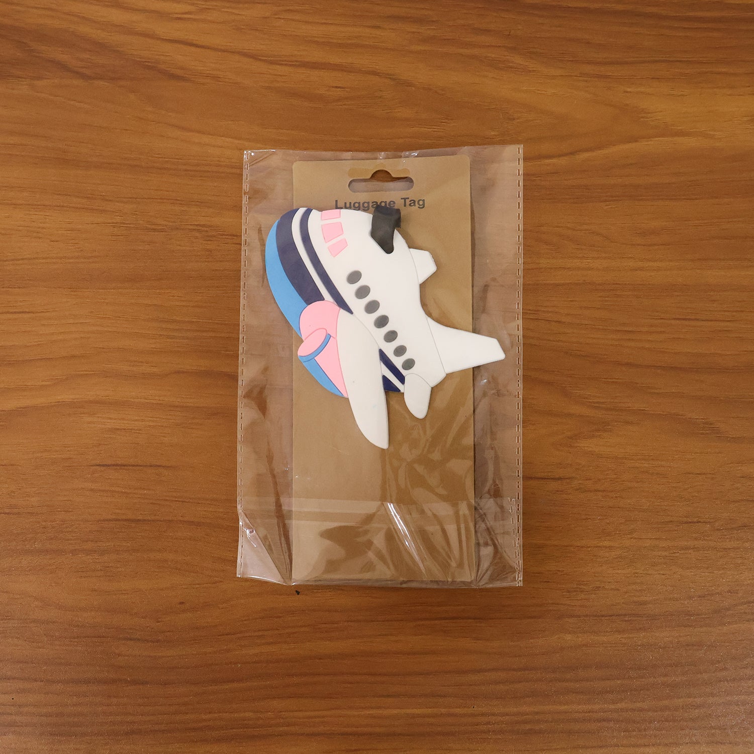 Wukusy airplane shape travel luggage bag tag with identification card, lightweight and durable for easy luggage marking.