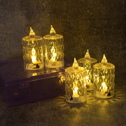 Six decorative LED crystal flameless candles from Wukusy in a home decor set, showcasing glowing crystal designs.