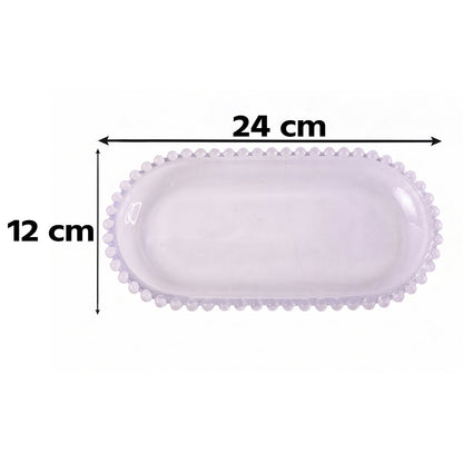 Clear glass 9-inch oval serving tray with beaded edge, ideal for snacks, by Wukusy. Elegant and durable for serving appetizers.
