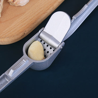 Wukusy 7030a garlic press made of lightweight aluminum, dishwasher safe, easy to use for cooking and baking in the kitchen.