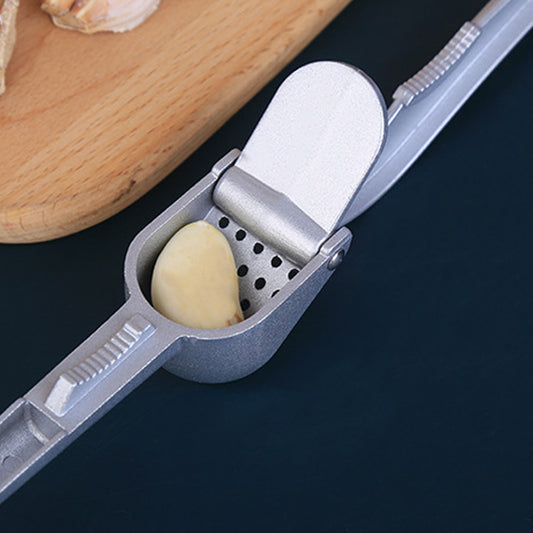 Wukusy 7030a garlic press made of lightweight aluminum, dishwasher safe, easy to use for cooking and baking in the kitchen.