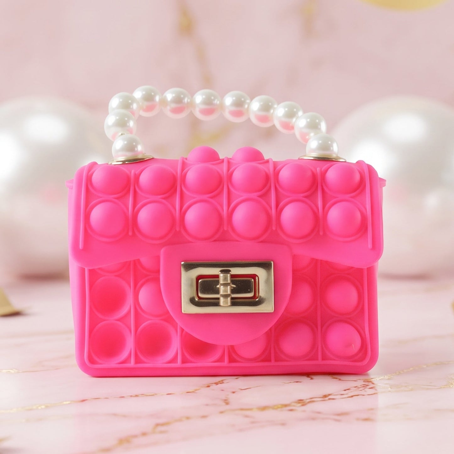 Kids Pop It fidget purse by Wukusy featuring silicone design, pearl handle, and playful style, perfect for children.