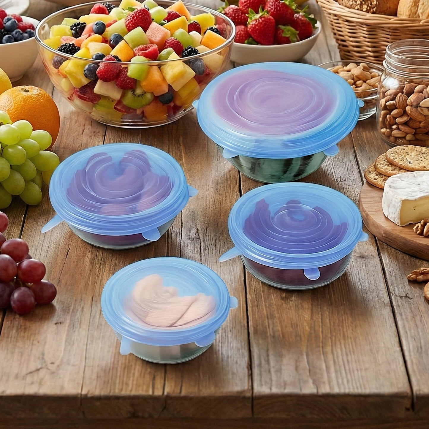 Set of four reusable silicone stretch lids by Wukusy, flexible and airtight for bowls and containers.