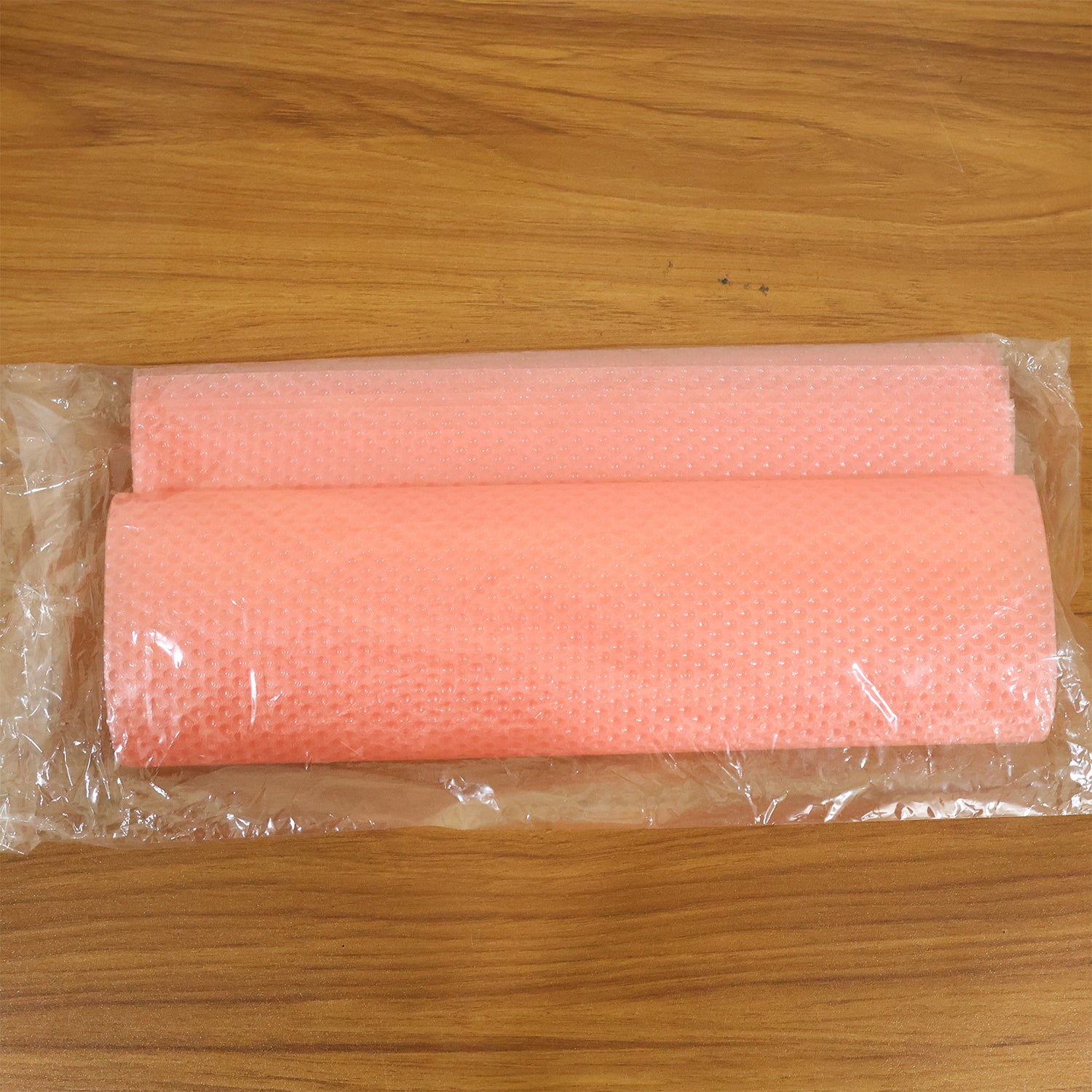 Set of four transparent plastic fridge mats showing textured surface and edges, measuring 45x29 cm, by Wukusy.