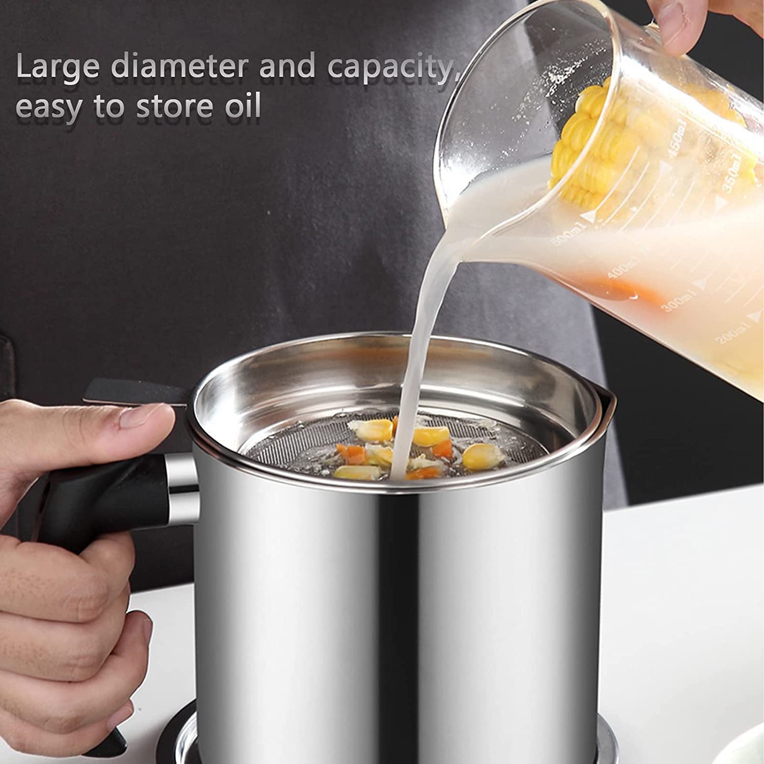 Wukusy stainless steel oil strainer pot with lid and filter mesh for filtering cooking oil and food residues.