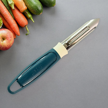 Wukusy Apex stainless steel potato peeler with ergonomic handle and sharp blade for efficient peeling in close-up image.
