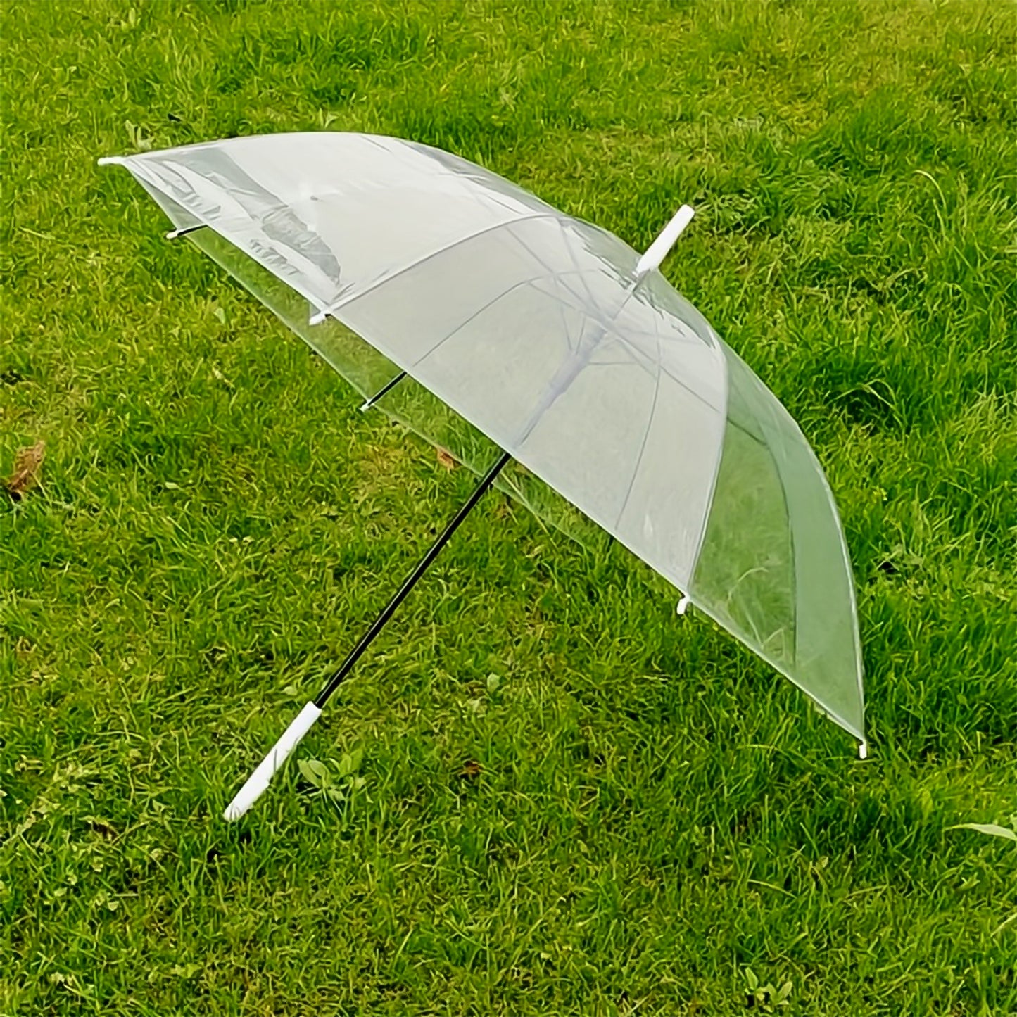 Clear dome umbrella with curved handle by Wukusy, perfect for home improvement, featuring transparent waterproof canopy.