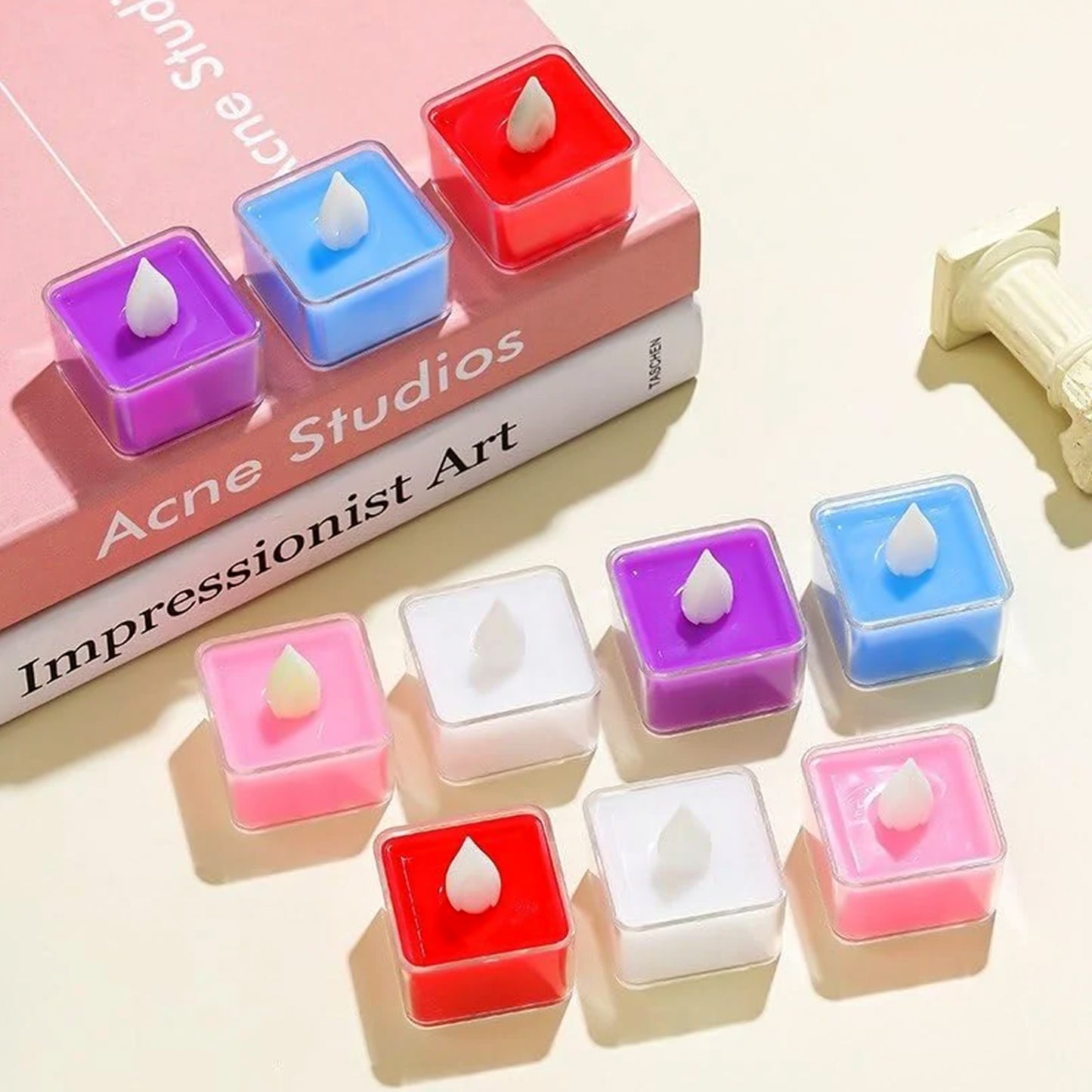 Set of 24 multi-color LED tealight candles by Wukusy, perfect for home decor and ambient lighting.