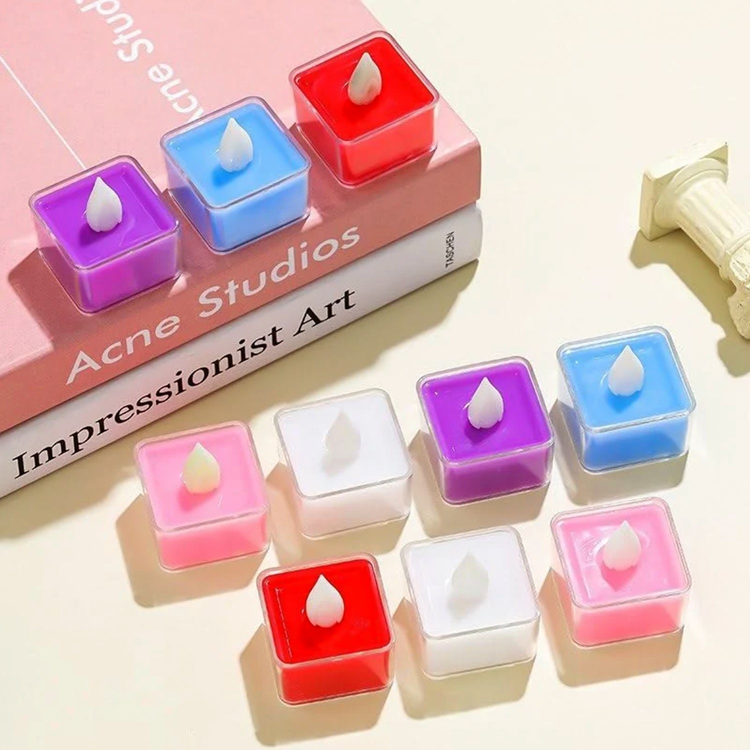 Set of 24 multi-color LED tealight candles by Wukusy, perfect for home decor and ambient lighting.