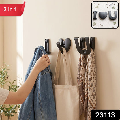 Wukusy premium heavy duty wall hook set with three 3-in-1 self-adhesive hooks for clothes and bags mounted on a wall.