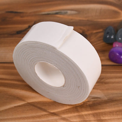 Wukusy small double-sided foam mounting tape for office use, shown in its compact packaging with the tape roll visible.