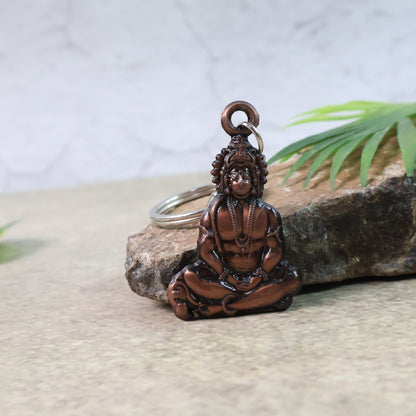 Wukusy Lord Hanuman sitting pose keychain with detailed craftsmanship, featuring Hanuman seated in a traditional pose.