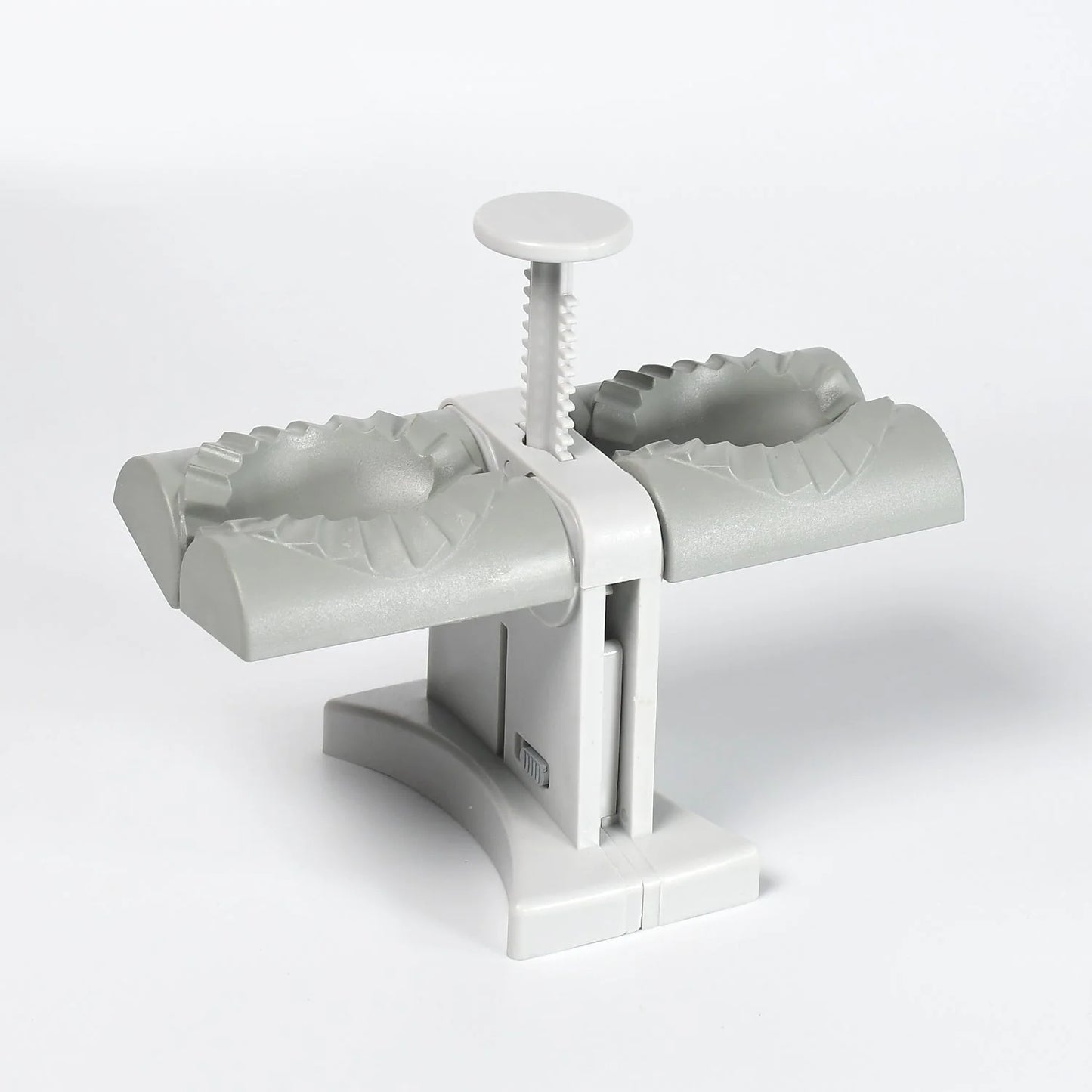 Wukusy 5300b dumpling maker mold with double heads for easy, quick dumpling wrapping in a household kitchen setting.