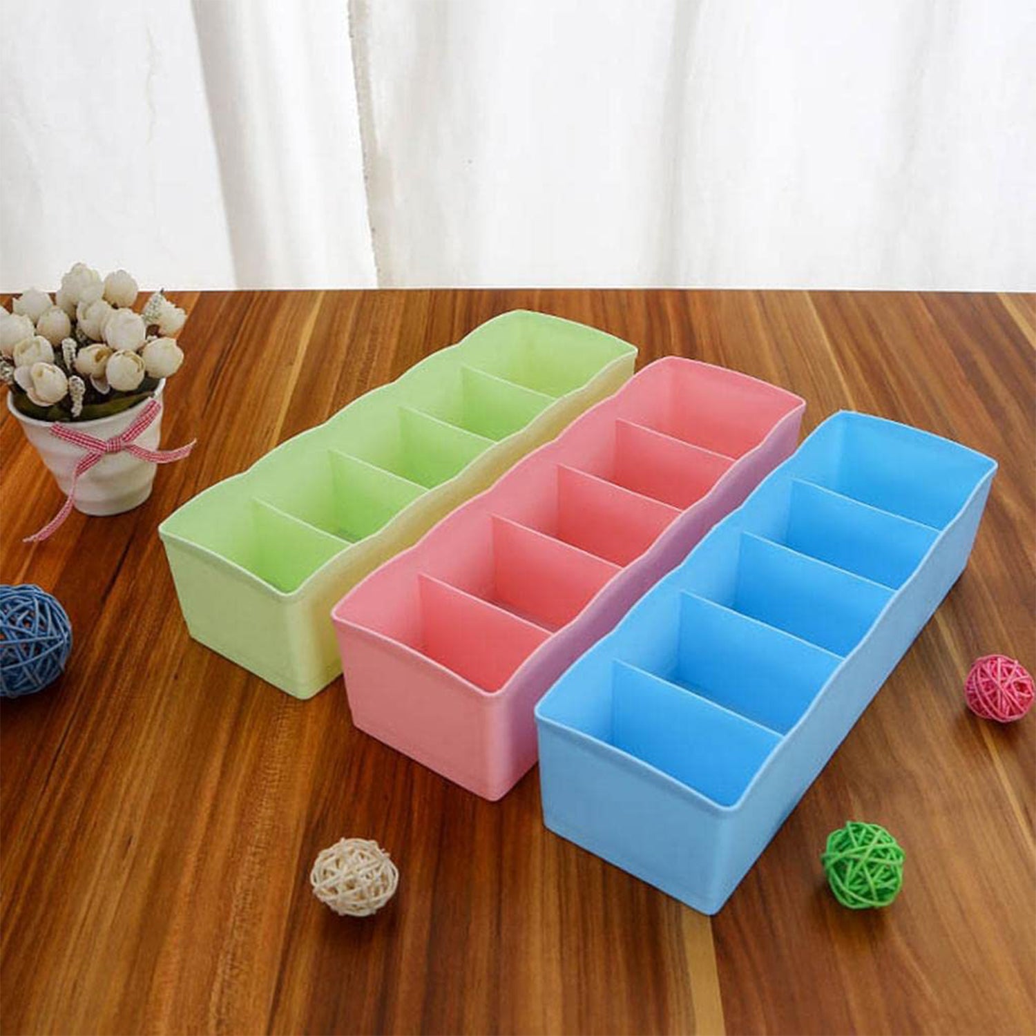Wukusy 4-pack multi-function desktop drawer storage boxes with 5 compartments for underwear, socks, ties, and clothing organization.