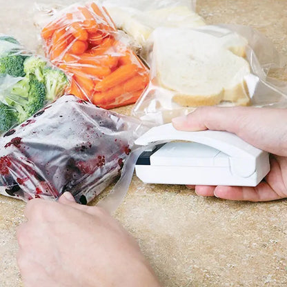 Wukusy 7675a mini portable plastic bag sealer and sealing machine for household use, compact and easy to operate.