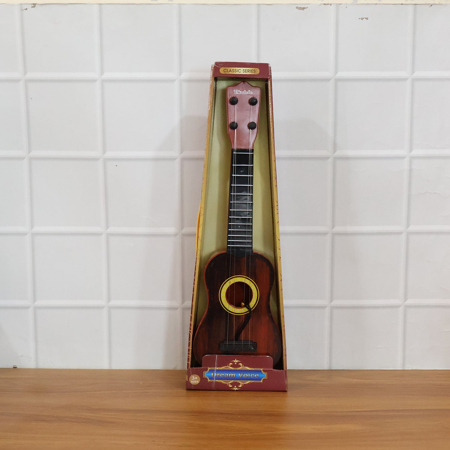 Wukusy classic wooden ukulele guitar for kids, beginner-friendly with natural wood finish and small size, ideal for young beginners