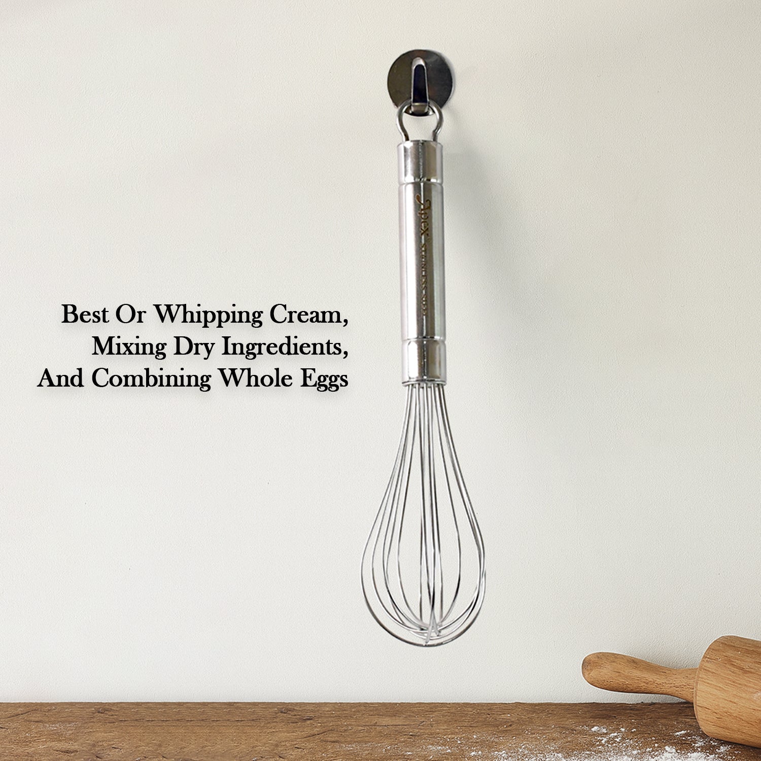 Wukusy Apex stainless steel small hand whisk for home kitchen, with a sleek handle and multiple wire loops for mixing and whisking.