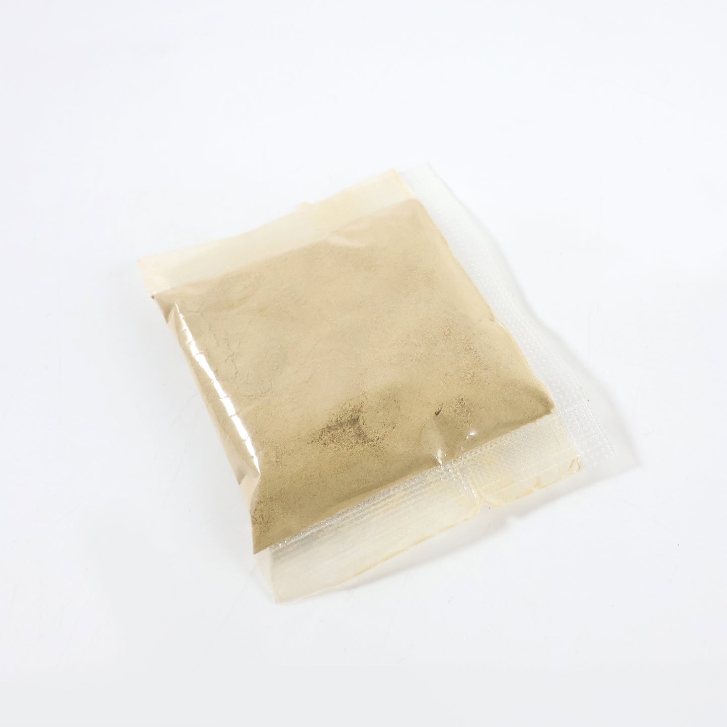 Wukusy Natural Multani Mitti face and body care powder in a 10-12g packet, fullers earth for skincare and cleansing.