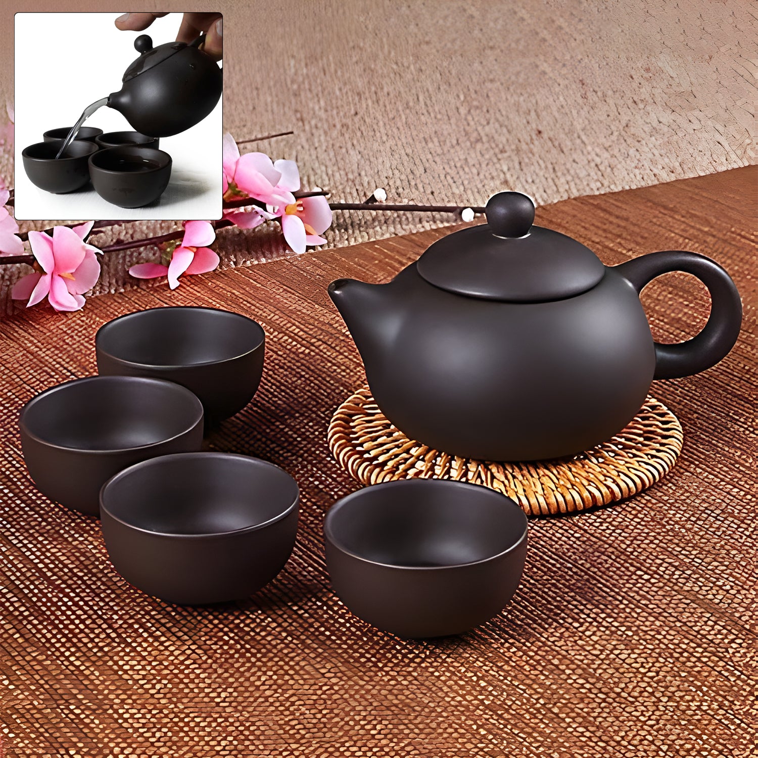 Black clay ceramic tea set with teapot and four cups by Wukusy, ideal for home and kitchen use.